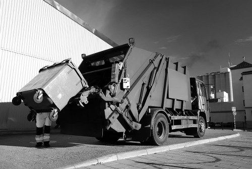 Modern waste clearance vehicles in action