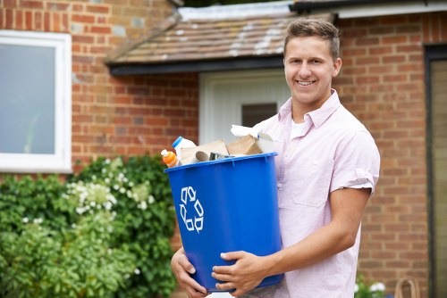 Satisfied customer enjoying a cleared West London garden