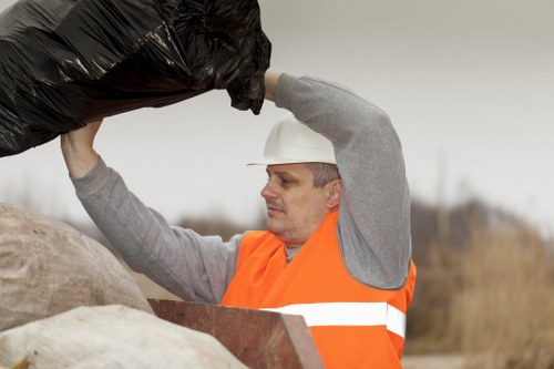 Residents sorting waste for recycling in West London